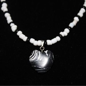 Black and white seas bead necklace with crystal pendant